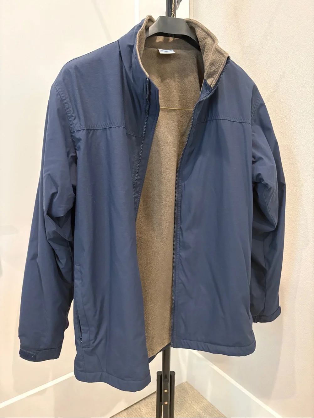 Columbia Men's Navy Jacket with Tan Fleece Lining and zip pockets - large
